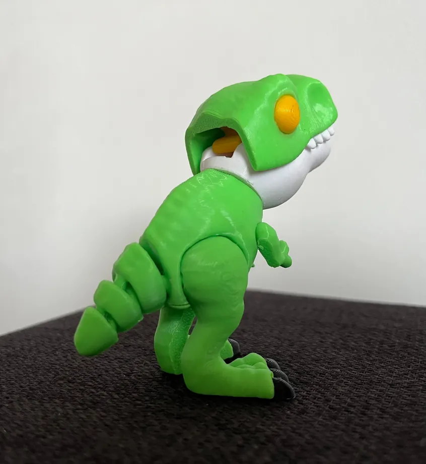 Dinosaurio multicolor flexible impreso en 3D