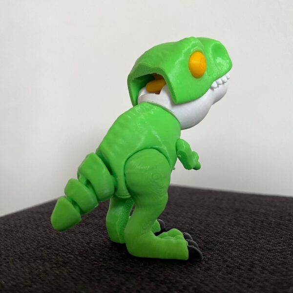 Dinosaurio color verde articulado