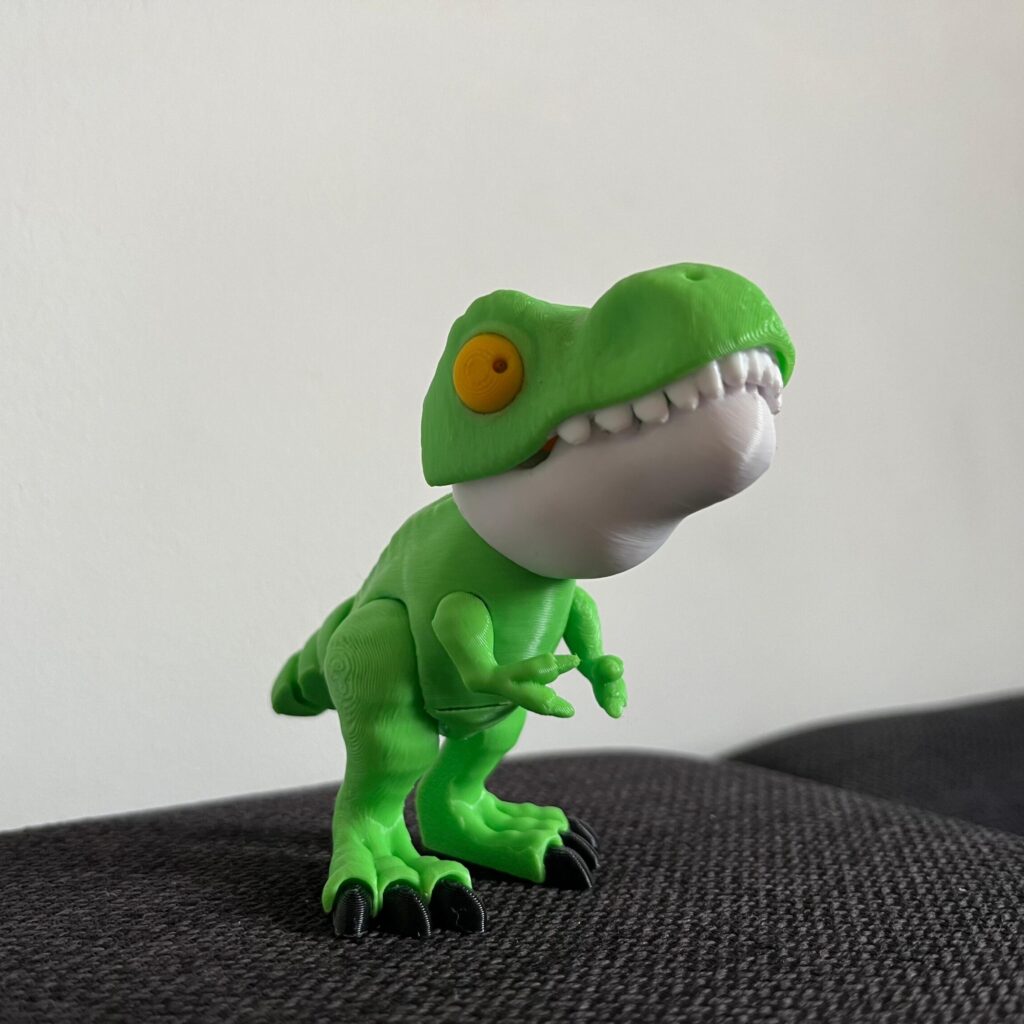 Dinosaurio color verde articulado