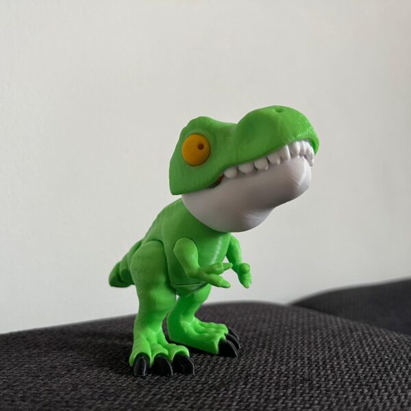 Dinosaurio color verde articulado