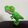 Dinosaurio color verde articulado