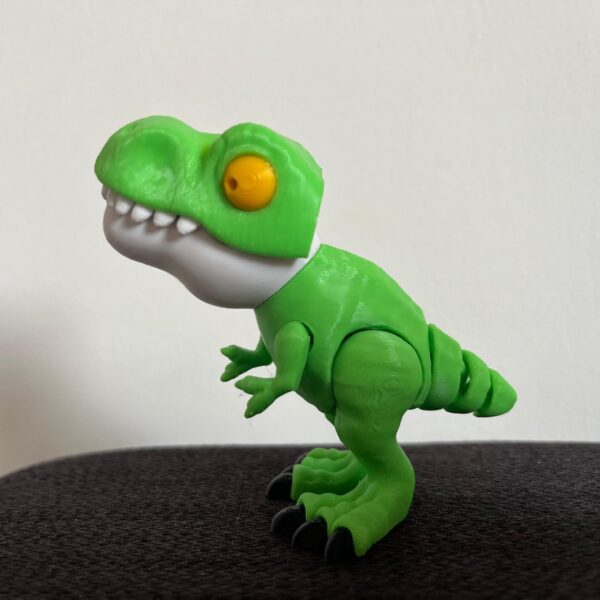 Dinosaurio color verde articulado