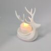 venado decorativo con vela artificial