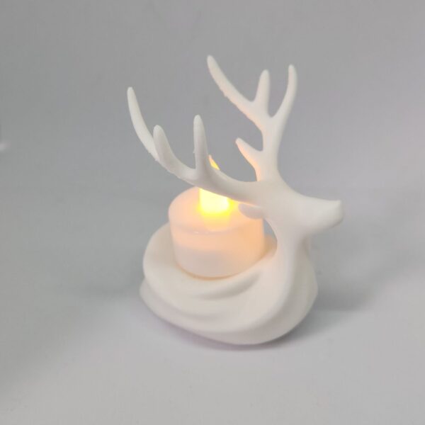 venado decorativo con vela artificial