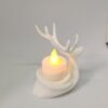 venado decorativo con vela artificial